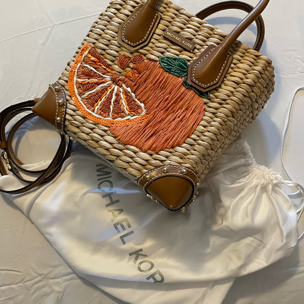 Micheal Kors straw and leather handbag!